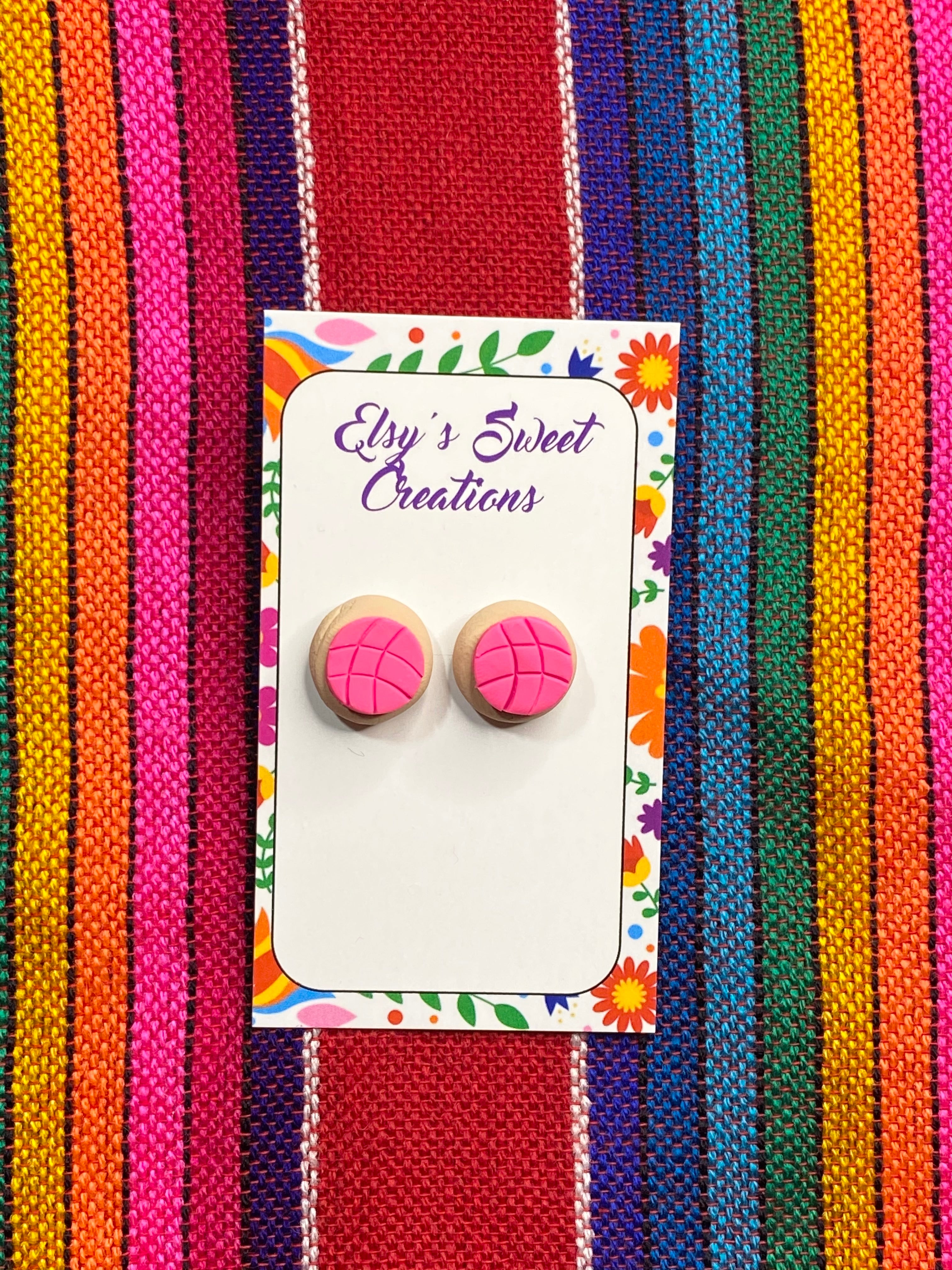 Pink concha stud earrings